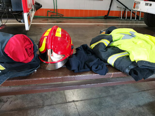 Close up portrait of protective work uniform lying in the bench