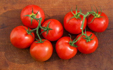 Tomatoes on wooden board