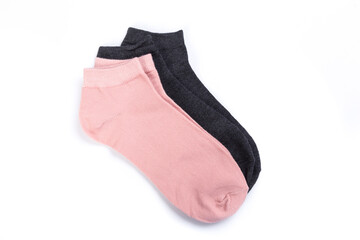 two pairs of colored short socks on a white background, top view