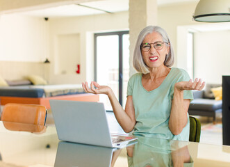 middle age woman feeling clueless and confused, not sure which choice or option to pick, wondering