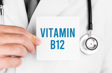 Doctor holding a card with text Vitamin B12, medical concept
