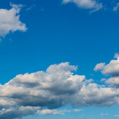 Beautiful blue sky with white clouds as a natural background.