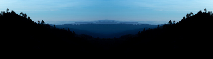 Blue mountains at sunrise panoramic abstract background, Geres National Park, Portugal.