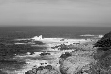 Ocean waves crashing on a rocky shore