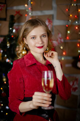 Celebrating Woman. Holiday People. Beautiful Girl with perfect Makeup Holding Glass of Champagne