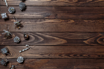 Merry Christmas. wooden background decorated with silver Christmas decorations.