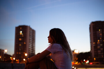 woman sitting on the street