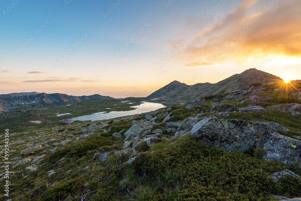 Sticker Sunset landscape with Kamenitsa peak and Tevno lake.