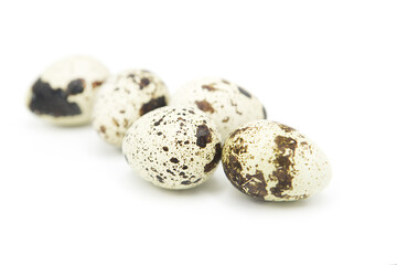 Quail organic eggs isolated on white background	