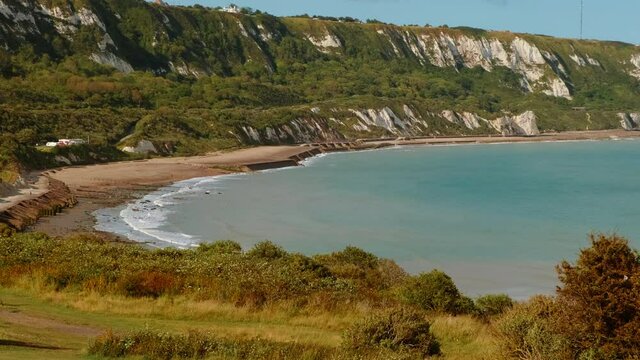 FOLKESTONE, circa 2020 - Wide view of the coast of Folkestone, a port town on the English Channel, in Kent, south-east England, UK