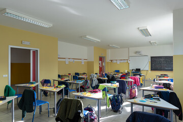 View of a classroom with desks and chairs