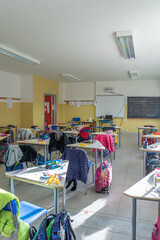 View of a classroom with desks and chairs