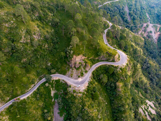 Aerial view of a road through the mountains. Taken through a drone in the himalayas.