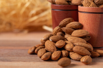 almond, almonds, amendoas, amêndoas, background, closeup, brown, straw background, straw, dry, food, fruit, gourmet, group, health, healthy, heap, ingredient, kernel, natural, nature, nut, nutrition, 