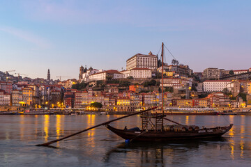 Porto city with rabelos boat on Douro river