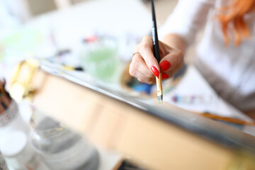 Female hand with red nails