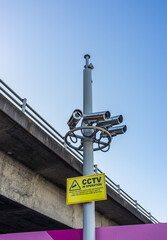 Fototapeta na wymiar CCTV cameras mounted overhead on a pole