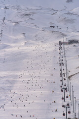 Naklejka na ściany i meble Kayseri / Turkey - January 14 2019: People skiing in Erciyes ski resort. Snowy Mount Erciyes