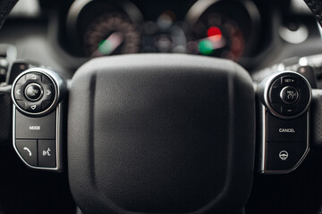 Modern car steering wheel with control panels