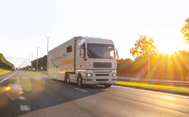 hydrogen fueled truck on the road driving. h2 combustion Truck engine for emission free ecofriendly...
