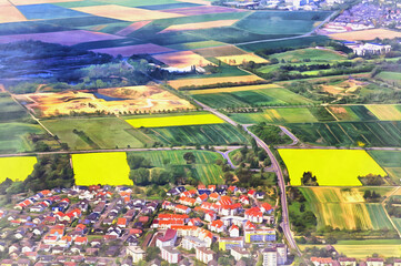Beautiful aerial view with cultivated fields and village colorful painting