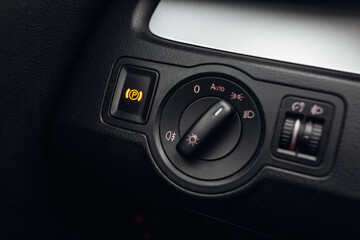 Headlights control panel in car