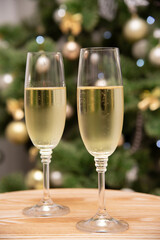 two glasses of champagne on the table
