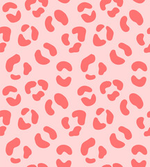 Vector seamless pattern of colored leopard spots fur print isolated on pink background
