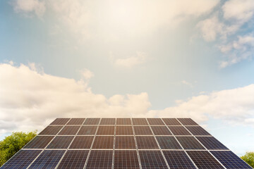 photovoltaic solar power panel on sky background