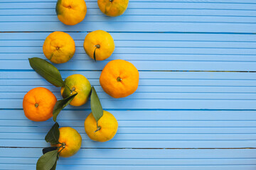 tangerines on the blue table