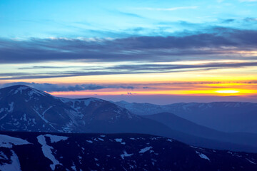 majestic sunset in the snowy mountains