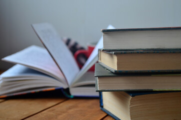 A stack of old books with yellowed pages, textbook, training, encyclopedia. Reading, knowledge....