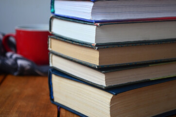 A stack of old books with yellowed pages, textbook, training, encyclopedia. Reading, knowledge....