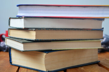 A stack of old books with yellowed pages, textbook, training, encyclopedia. Reading, knowledge....