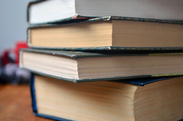 A stack of old books with yellowed pages, textbook, training, encyclopedia. Reading, knowledge....