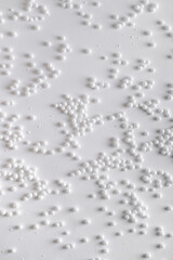 New Year's decor. Christmas or winter composition. Snowflakes and snowballs on a white background.Christmas, winter, new year concept. Flat lay, top view.