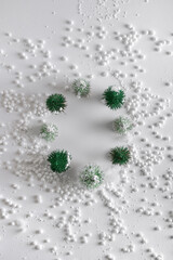 Christmas trees in the snow in the shape of a circle . New Year's decor. Snowflakes and snowball on a white background.Christmas, winter, new year concept.