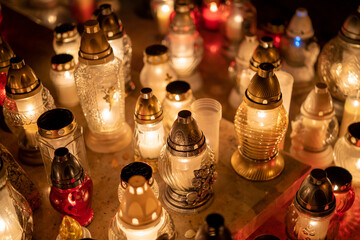 Candles on the grave. Cemetery. A resting place.