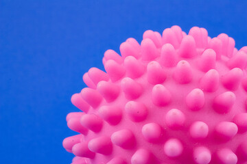 Close up of pink dryer ball