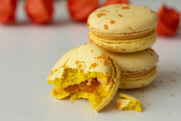 Macaroons. Delicious french desserts. Yellow macaroons. Macaroons on the table