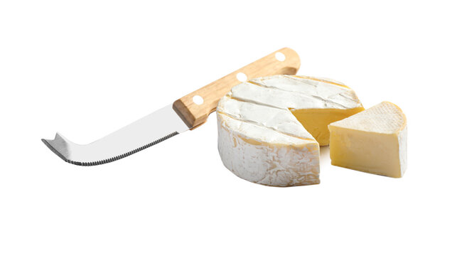 Cut Camembert cheese and knife on white background