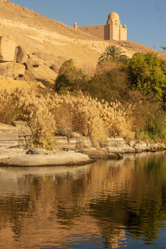 Beautiful image of the Mediterranean the banks of the Nile river with Islamic castle in the background