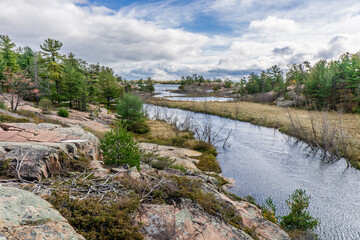 Fototapeta na wymiar The Chikanishing trail is an easy hike in Killarney Provincial Park that allows you to discover the rugged Georgian Bay coastline, typical of the Canadian Shield