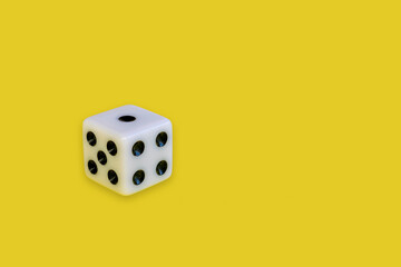 gambling dice isolated on yellow background