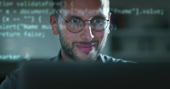Cinematic shot of programer smiling satisfied while busy working with latest innovative sophisticated technology display application with augmented reality holograms for realization of new codeproject