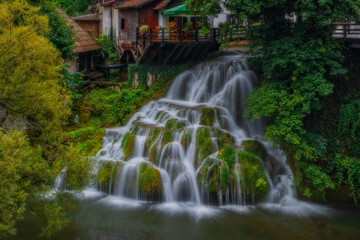 Prvi Slap - First Waterfall on Korana river canyon in village of Rastoke. Slunj in Croatia. Near Plitvice Lakes National Park. August 2020, long exposure picture.