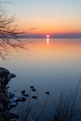 sunrise on the lake in winter