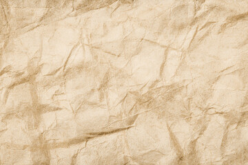 Brown crumpled paper texture. Grunge old parchment background. Stained dirty burned message backdrop for graphic design. Vintage ancient empty copy space background.