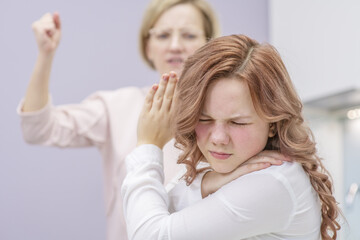 The teenage girl closed her eyes and closed her ears. Her mother in the background chastises her. Relationship problems, puberty