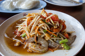 Thai food, green papaya salad with raw shrimps and fermented fish sauce, Som Tam